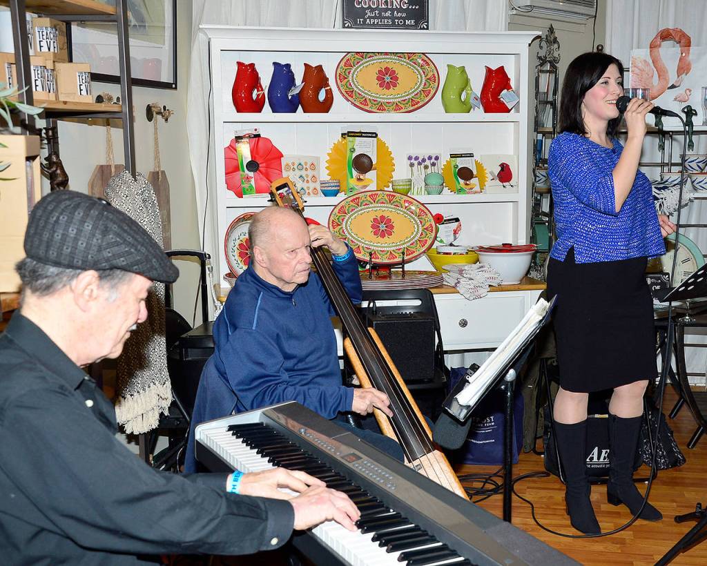 Musicians Chris Clark and Bob Hammer with singer Jennifer Kienzle filled a cozy space at Birches with jazz.                                Mary Miller Photo