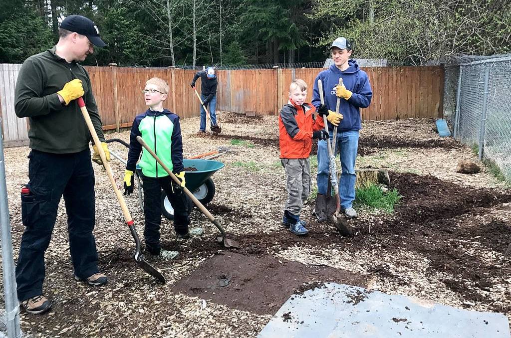 Courtesy Photo                                Church groups recently volunteered to help with yard maintenance at Echo Glen Children&rsquo;s Center, in support of the Canine Connections program.