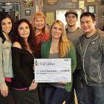 Courtesy Photo                                Posing with a donation check for Canine Connections are, from left: Alexandra French; Debbie Barrientes, owner of Infusion Bar and Grill; Kristine Haak of Imageworks Northwest; Jessica Self, Valley Young Professionals; Michael Hughes, owner of Dark Horse Ink; and Chris Barrientes, also of Infusion.