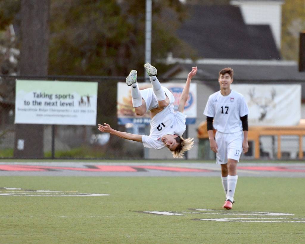 Caelan Johnson does a flip after scoring a goal against Inglemoor in the first half of the game on Friday, April 28. (Photo courtesy of Calder Productions)