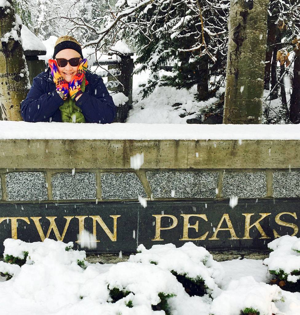 Walker with a Twin Peaks sign she found while in Whistler, British Colombia, in November. (Courtesy Photo)