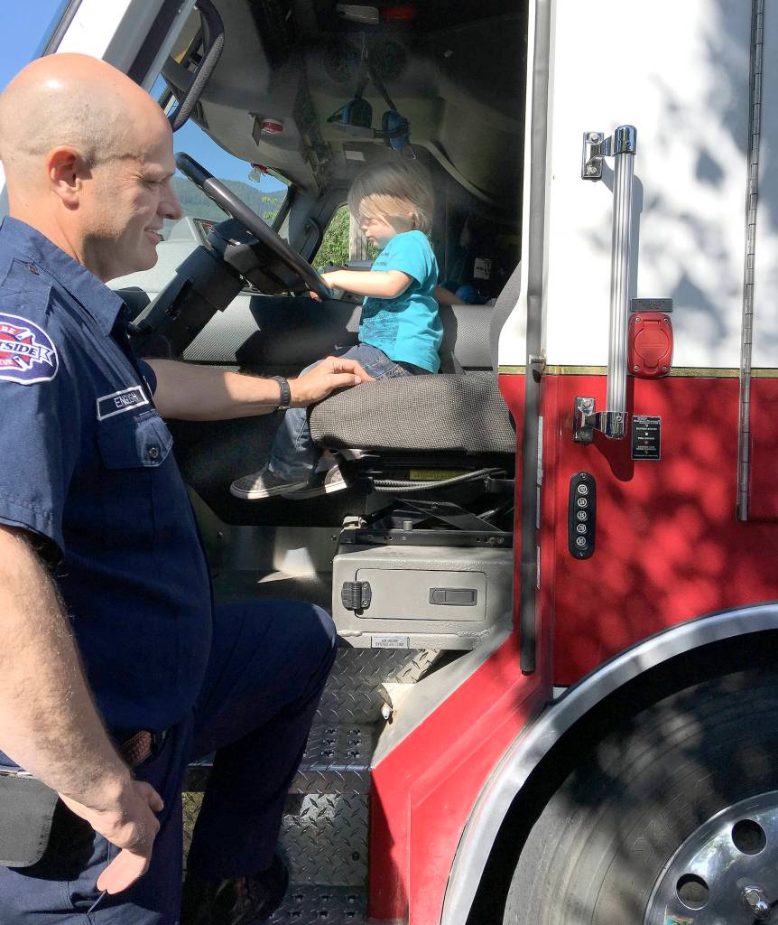 Courtesy Photo                                Children can explore the ladder trucks and other emergency vehicles Friday morning during the Snoqualmie Valley Indoor Playground&rsquo;s annual Safety Fair.