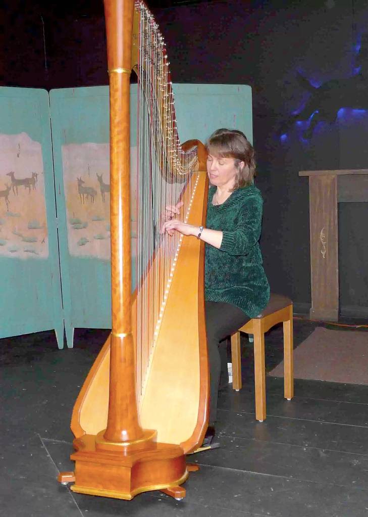 Harpist Cynthia Kuni performs at the Black Dog Cafe. (Courtesy Photo)