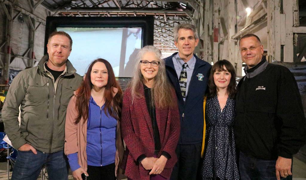 City officials and Twin Peaks cast and crew got together for a photo at Saturday&rsquo;s event. From left, Location Scout and Manager Dave Drummond, Events Consultant Lizzy Billington, Actor Jodee Thelen, Snoqualmie Mayor Matt Larson, Actor Lisa Coronado, and Parks and Recreation Director Dan Marcinko. (Evan Pappas/Staff Photo)