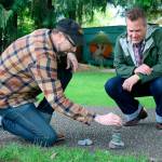 Chris Syme and Patrick St. Mary stack rocks to as part of the hunt.                                (Evan Pappas/Staff Photo)