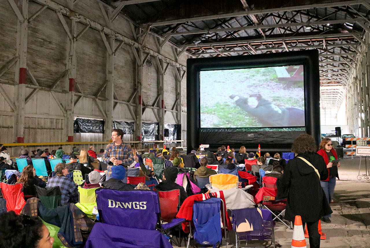 Pictures and video from the scavenger hunt were displayed on the screen before the event began.                                (Evan Pappas/Staff Photo)