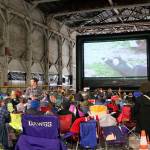 Pictures and video from the scavenger hunt were displayed on the screen before the event began.                                (Evan Pappas/Staff Photo)