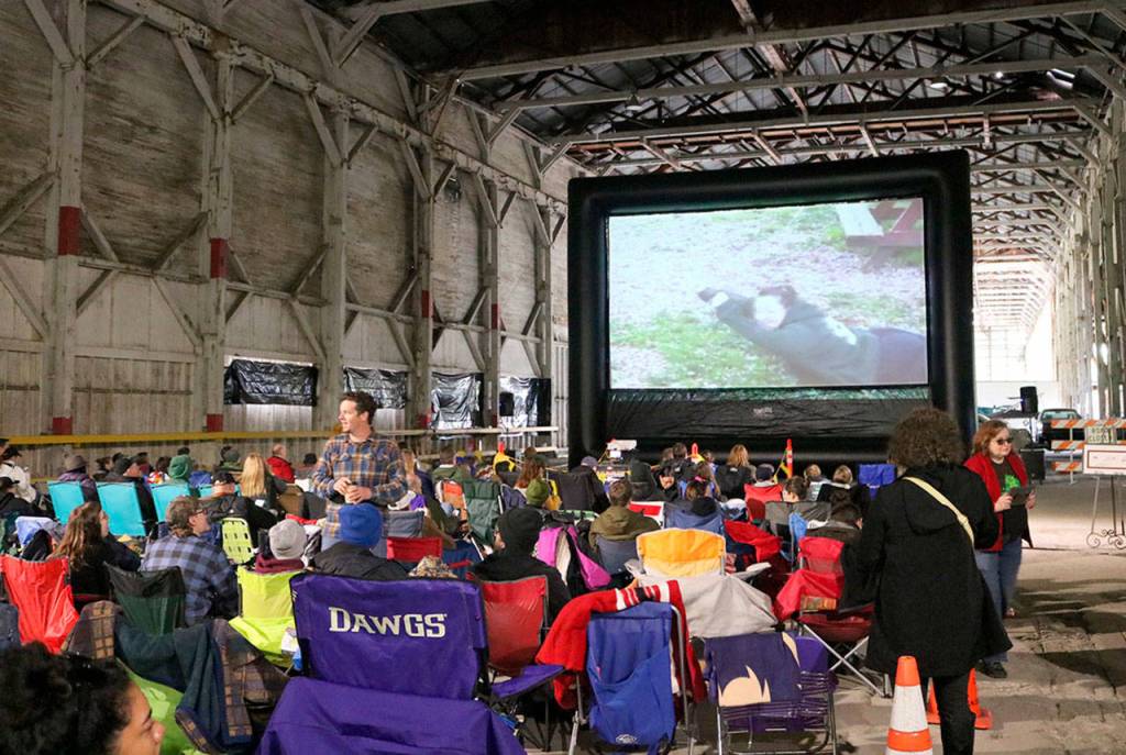 Pictures and video from the scavenger hunt were displayed on the screen before the event began.                                (Evan Pappas/Staff Photo)