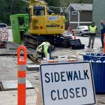 By Friday, May 12, the repairs were done and the road and sidewalk were awaiting new asphalt and concrete.                                Carol Ladwig/Staff Photo