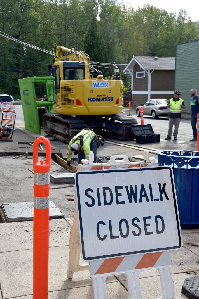 By Friday, May 12, the repairs were done and the road and sidewalk were awaiting new asphalt and concrete.                                Carol Ladwig/Staff Photo