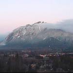 The lights of North Bend create an inviting glow against the cloudy backdrop of the ever-changing Mount Si in this first-place photo in the Valley Record&rsquo;s annual reader photo contest. Credit for this photo goes to North Bend Economic Development Office Coordinator Tom Meagher, via the city&rsquo;s webcam.
