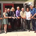 Cutting the ribbon on the new North Bend office of Friends of Youth are, from left: Gena Palm, Director of Youth and Family Services, Friends of Youth; King County Councilmember Kathy Lambert; Bill Savoy, Board Chair, Friends of Youth; Terry Pottmeyer, CEO, Friends of Youth; Congressman Dave Reichert; Ken Hearing, Mayor of North Bend; Jennifer Larson, SanMar; and Matt Larson, Mayor of Snoqualmie.                                Courtesy Photo