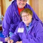 Meri McGovern helped sign guests in for the luncheon Sunday.                                Photo courtesy of Mary Miller