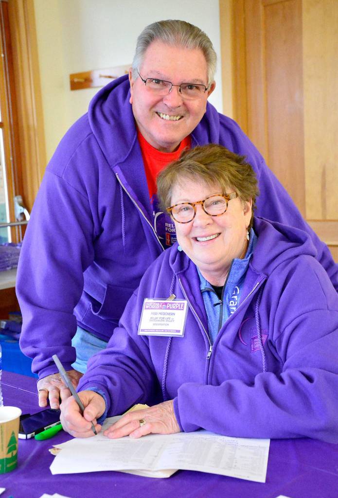 Meri McGovern helped sign guests in for the luncheon Sunday.                                Photo courtesy of Mary Miller