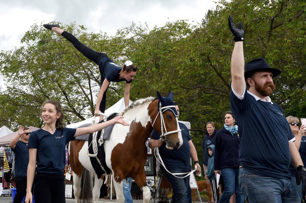 Cascade Vaulters showed off their moves during Saturday&rsquo;s parade. (Carol Ladwig/Staff Photo)