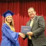 Lola Marum accepts her diploma from Snoqualmie Valley School District Superintendent Joel Aune.                                (Evan Pappas/Staff Photo)