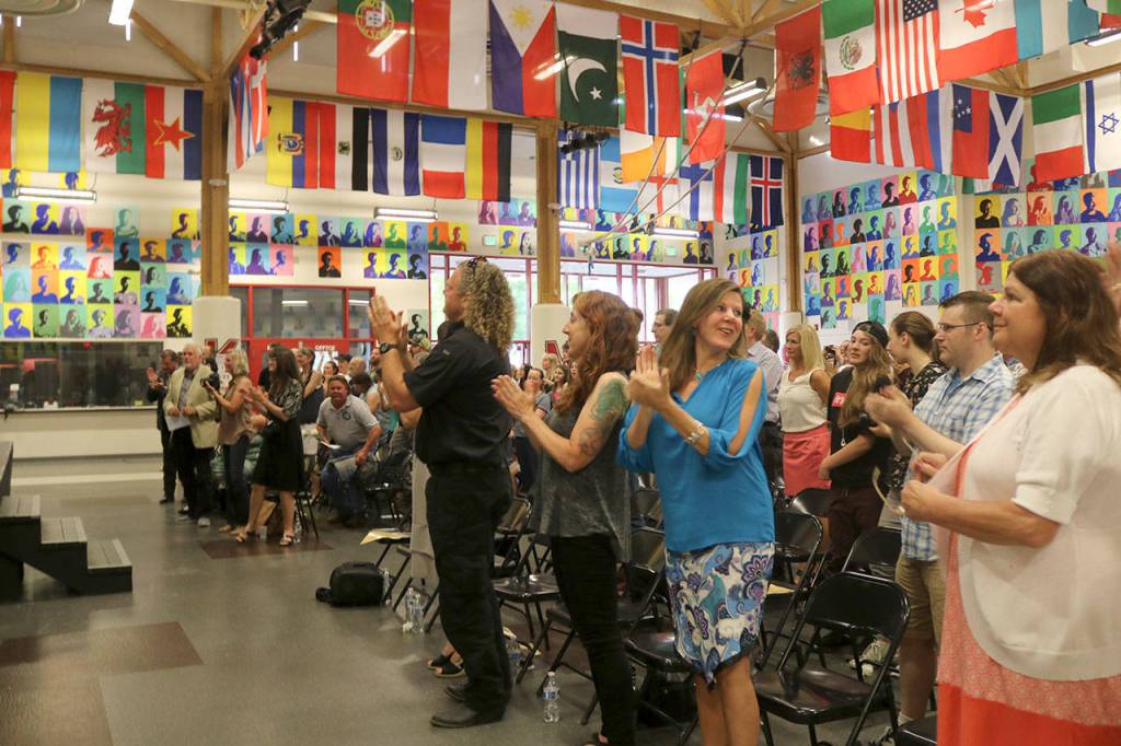The audience applauds the Two Rivers graduating class of 2017.                                (Evan Pappas/Staff Photo)