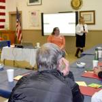 Pastor Lee Carney welcomes guests to a meeting of community leaders to learn about the plans and coming changes for the Valley&rsquo;s seasonal homeless shelter and day center.                                Carol Ladwig/Staff Photo