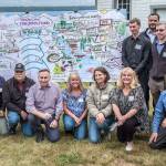 Celebrating the completion of a three-year effort to develop recommendations for protecting wildlife, the watershed and agriculture, King County Executive Dow Constantine and members of the Fish, Farm, Flood committee took a group photo.                                Photo courtesy of Eli Brownell