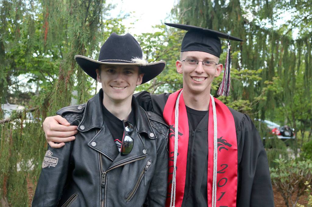 Chris Hunt congratulates his brother Devin.                                (Evan Pappas/Staff Photo)