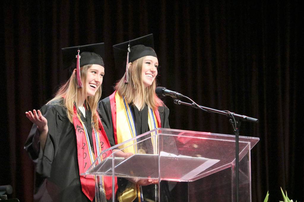 Margaret and Julia Knox, valedictorians and twins, give a speech about about the possibilities for the future of the class of 2017 at Cedarcrest&rsquo;s commencement ceremony June 16.                                (Evan Pappas/Staff Photo)