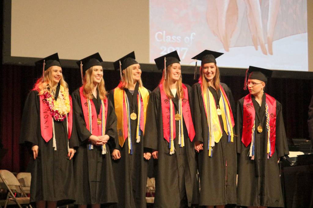 The six students with the highest GPAs were recognized at the ceremony. They are, from left, Salutatorian Courtney Tobin, Valedictorians Alia Hanson, Alice Ish, Julie Know, Margaret Knox and Raina Mooney.                                (Evan Pappas/Staff Photo)
