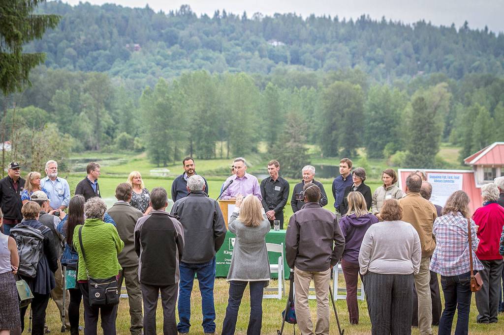 King County Executive Dow Constantine addresses the Fish, Farm, Flood advisory committee, after it delivered a series of recommendations to improve fish habitat while protecting the watershed and farmers&rsquo; interests, Monday at Carnation Farm.                                Photo courtesy of Eli Brownell