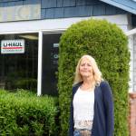 Cindy Everson, outside of the main office at Ole Cedar Mill Mini Storage. The office building was also used during the properties years as a Cedar Mill. (Evan Pappas/Staff Photo)