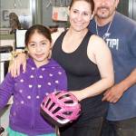 Janet Becerra Celis, pictured with her parents, Elia and Erasmo, is a 2017 Bikes for Books winner at Fall City Elementary School.                                Courtesy Photo