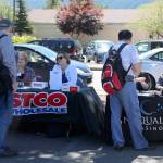 Community job fair attendees speak with representatives from various businesses to discuss local job openings.                                (Evan Pappas/Staff Photo)