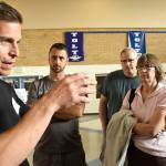 Road engineer Larry Jaramillo explains the problem on the bridge, the connections of the bridge deck to the supports were made with too-small bolts and not enough of them.                                Carol Ladwig/Staff Photo