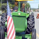 Jim and Peggy Richter drive their antique tractor in the 2015 parade.                                William Shaw/File Photo