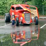 Bentley Steele, 3, points out his favorite features on Tom DeStefano&rsquo;s 1934 Highboy at the 2016 car show.                                Carol Ladwig/File Photo
