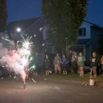 Residents of homes across from Community Park took advantage of the street closure to set off some of their own fireworks before the main event. (Evan Pappas/Staff Photo)