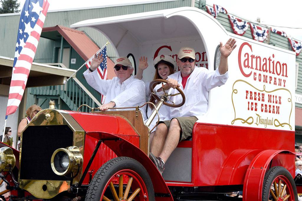 The Carnation Milk Truck got lots of requests for ice cream during the parade. (Carol Ladwig Staff Photo)