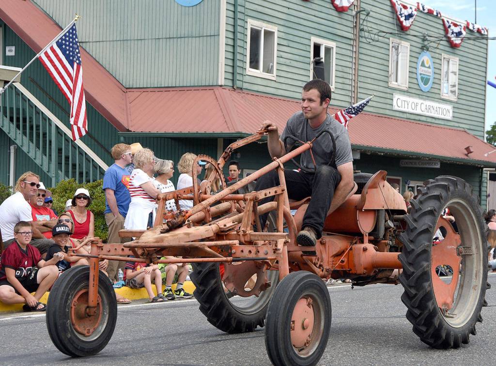 This unusual old tractor got a lot of questions during the parade. (Carol Ladwig Staff Photo)