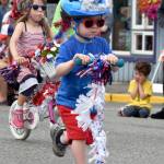 Decorated scooters abounded in the kiddie parade. (Carol Ladwig Staff Photo)