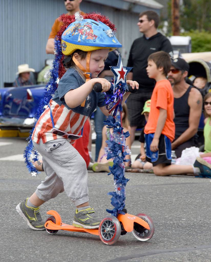 Decorated scooter riders, too. (Carol Ladwig Staff Photo)