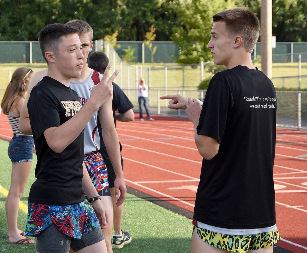 Ryan LaTurner, left, and Ian Fay prepare for the start of the race. Carol Ladwig/Staff Photo