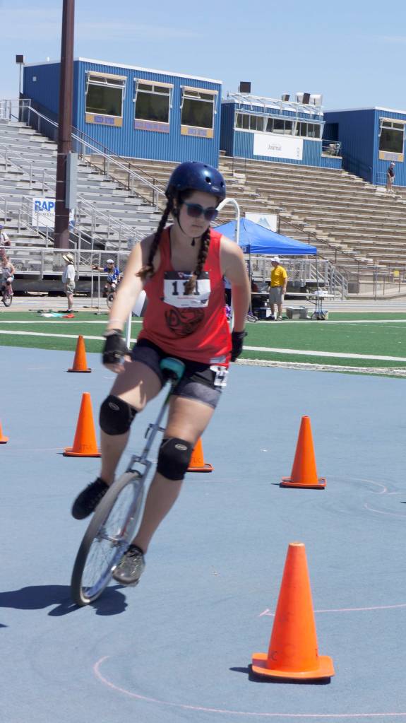 A Snoqualmie Valley unicyclist takes on the obstacle course at NAUCC 2016 in South Dakota. (Courtesy Photo)