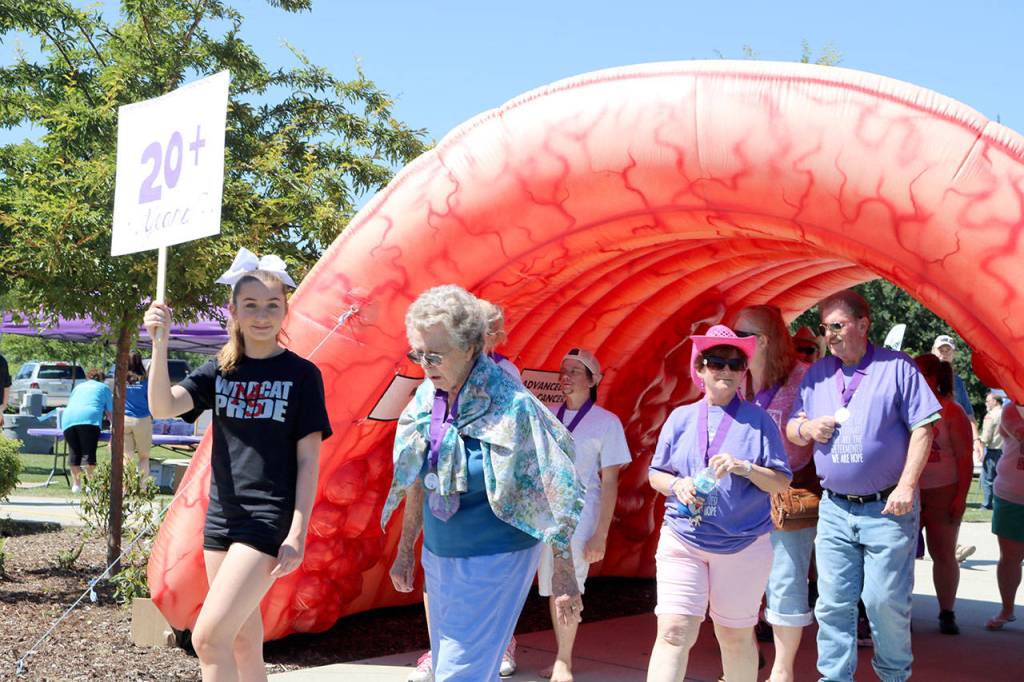 The group of survivors for more than 20 years begins their trek around the park. (Evan Pappas/Staff Photo)