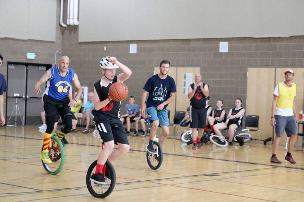 Sam Holmes of the SVUC basketball team, breaks away from the Golden State Revolution opponent. (Evan Pappas/Staff Photo)