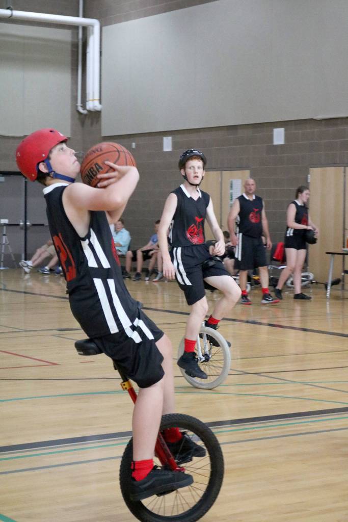 Trevor Bradshaw stops, stays under control, and shoots for 2 points. (Evan Pappas/Staff Photo)