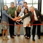 Cutting the ribbon on the new Bartell Drugs on Snoqualmie Ridge are, from left, Snoqualmie Valley Chamber of Commerce Board President Carolyn Simpson, Snoqualmie Mayor Matt Larson, Store Manager Taylor Isenhour, EDG property developer representative Tom Erlandson, Pharmacy ManagerMiy-yong O&rsquo;Brian, and Bartell Chairman and CEO, George D. Bartell.                                (William Shaw/Staff Photo)