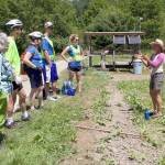 At a stop at Hearth Farm, Rails to Trails participants learn about the farm&rsquo;s sustainability efforts.                                Photo courtesy of Ray Lapine