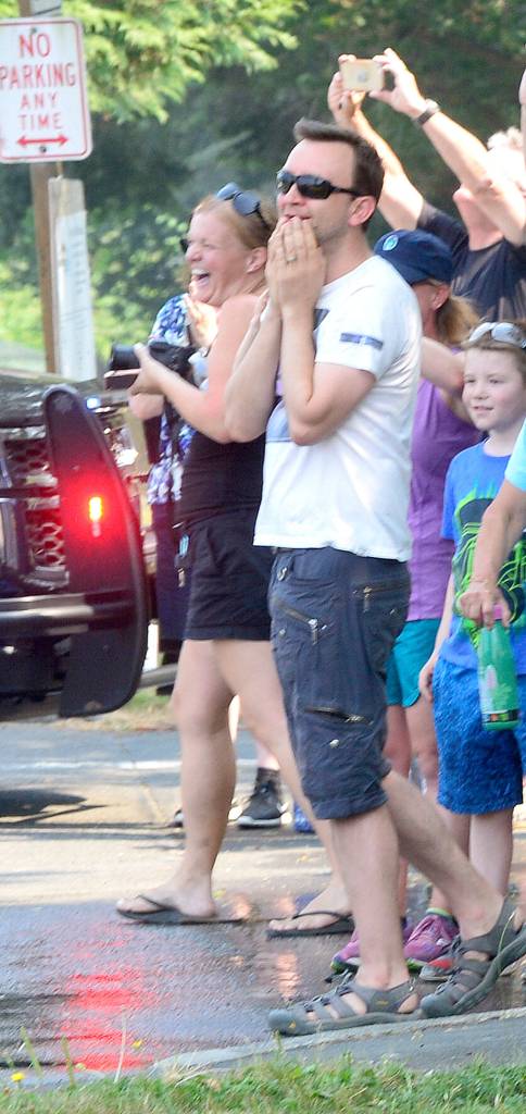 Haines husband reacts as he sees her for the first time since Monday, as she disembarked from the rescue helicopter.                                Photo courtesy of Mary Miller