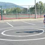 Molly Drango, 6, completes a figure-eight exercise at the Tanner Jeans Bike Rodeo Aug. 1.                                (Carol Ladwig/Staff Photo)