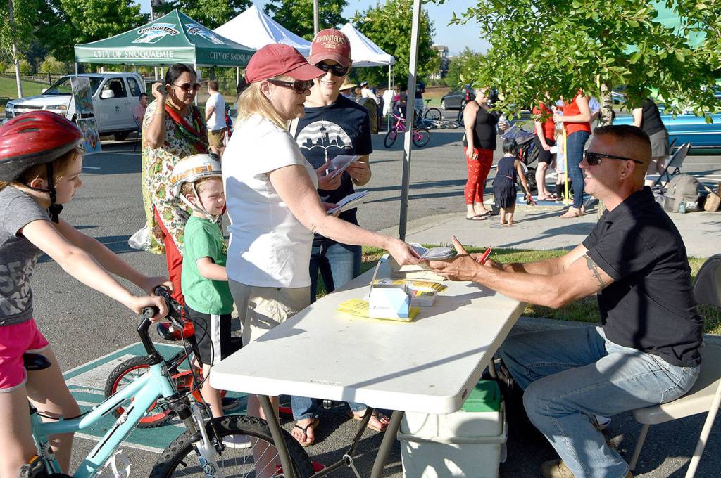Michael Marinos talks to participants about gun safety at the Aug. 1 event.                                (Carol Ladwig/Staff Photo)