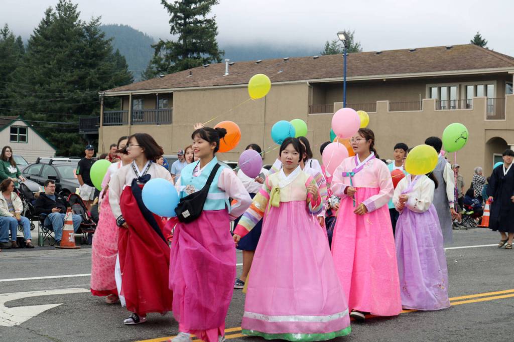 Exchange students from Snoqualmie&rsquo;s sister city of Gangjin, South Korea, walked in the parade and performed a dance to Korean pop music.                                (Evan Pappas/Staff Photo)