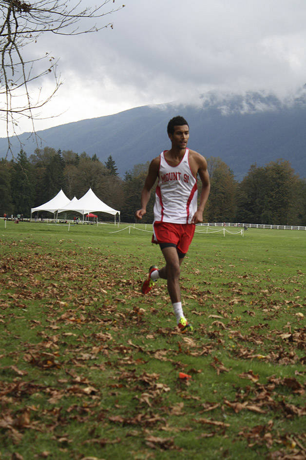 Mount Si runner Devin Sharps races at Mountain Meadows Farm in a 2013 home meet for the team.                                (File Photo)